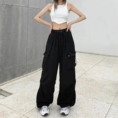 American retro tooling slacks female drape straight beam foot trousers summertime joker loose ins wide-legged pants Novara Shop Women Casual Joggers Tech Pants Solid Low Waist Pants Drawstring Wide Leg Baggy Trousers Y2k Streetwear Oversize Sweatpants  Novara Shop  Women Casual Joggers Tech Pants Solid Low Waist Pants Drawstring Wide Leg Baggy Trousers Y2k Streetwear Oversize Sweatpants
