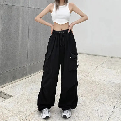 American retro tooling slacks female drape straight beam foot trousers summertime joker loose ins wide-legged pants Novara Shop Women Casual Joggers Tech Pants Solid Low Waist Pants Drawstring Wide Leg Baggy Trousers Y2k Streetwear Oversize Sweatpants  Novara Shop  Women Casual Joggers Tech Pants Solid Low Waist Pants Drawstring Wide Leg Baggy Trousers Y2k Streetwear Oversize Sweatpants