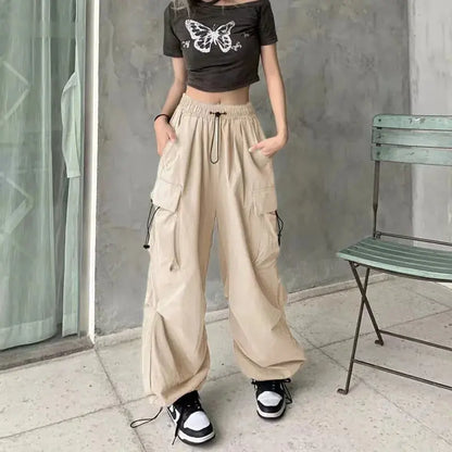 American retro tooling slacks female drape straight beam foot trousers summertime joker loose ins wide-legged pants Novara Shop Women Casual Joggers Tech Pants Solid Low Waist Pants Drawstring Wide Leg Baggy Trousers Y2k Streetwear Oversize Sweatpants  Novara Shop  Women Casual Joggers Tech Pants Solid Low Waist Pants Drawstring Wide Leg Baggy Trousers Y2k Streetwear Oversize Sweatpants