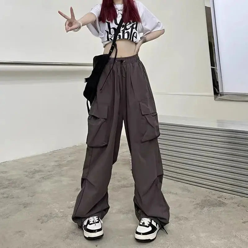 American retro tooling slacks female drape straight beam foot trousers summertime joker loose ins wide-legged pants Novara Shop Women Casual Joggers Tech Pants Solid Low Waist Pants Drawstring Wide Leg Baggy Trousers Y2k Streetwear Oversize Sweatpants  Novara Shop  Women Casual Joggers Tech Pants Solid Low Waist Pants Drawstring Wide Leg Baggy Trousers Y2k Streetwear Oversize Sweatpants