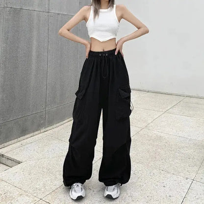 American retro tooling slacks female drape straight beam foot trousers summertime joker loose ins wide-legged pants Novara Shop Women Casual Joggers Tech Pants Solid Low Waist Pants Drawstring Wide Leg Baggy Trousers Y2k Streetwear Oversize Sweatpants  Novara Shop  Women Casual Joggers Tech Pants Solid Low Waist Pants Drawstring Wide Leg Baggy Trousers Y2k Streetwear Oversize Sweatpants