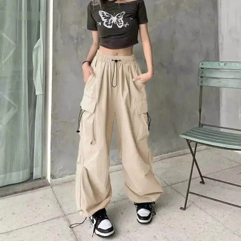 American retro tooling slacks female drape straight beam foot trousers summertime joker loose ins wide-legged pants Novara Shop Women Casual Joggers Tech Pants Solid Low Waist Pants Drawstring Wide Leg Baggy Trousers Y2k Streetwear Oversize Sweatpants  Novara Shop  Women Casual Joggers Tech Pants Solid Low Waist Pants Drawstring Wide Leg Baggy Trousers Y2k Streetwear Oversize Sweatpants