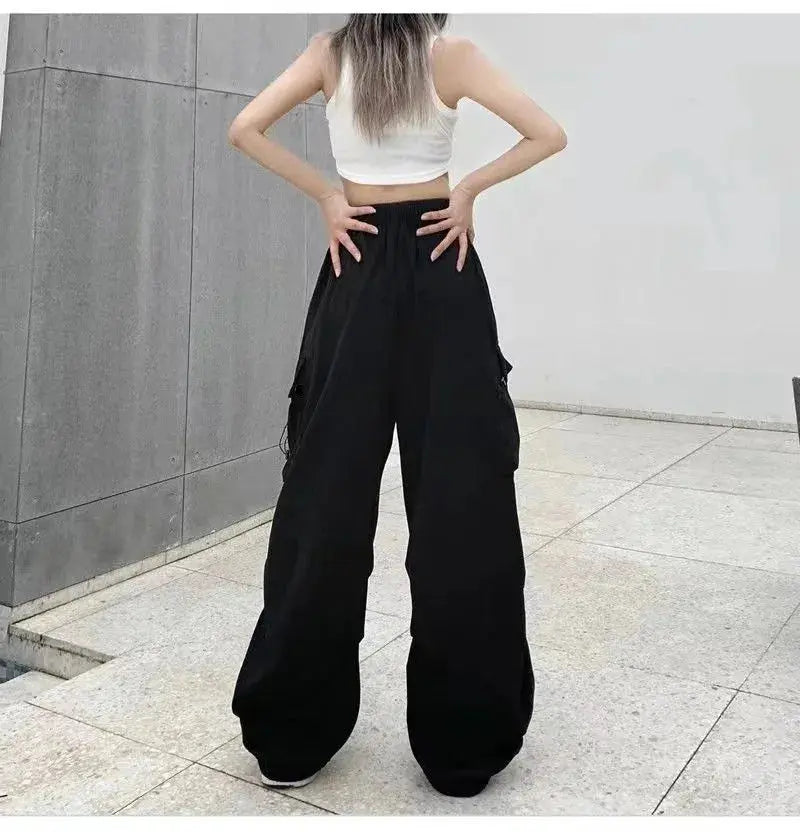 American retro tooling slacks female drape straight beam foot trousers summertime joker loose ins wide-legged pants Novara Shop Women Casual Joggers Tech Pants Solid Low Waist Pants Drawstring Wide Leg Baggy Trousers Y2k Streetwear Oversize Sweatpants  Novara Shop  Women Casual Joggers Tech Pants Solid Low Waist Pants Drawstring Wide Leg Baggy Trousers Y2k Streetwear Oversize Sweatpants